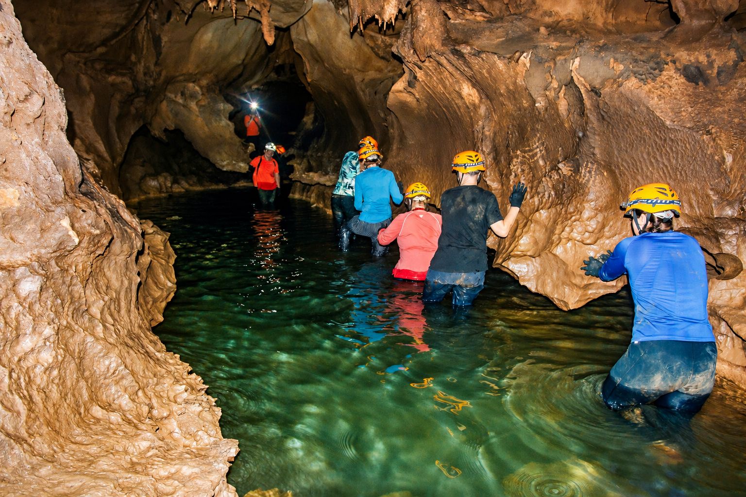 Exploring underground waterways on a cave expedition
